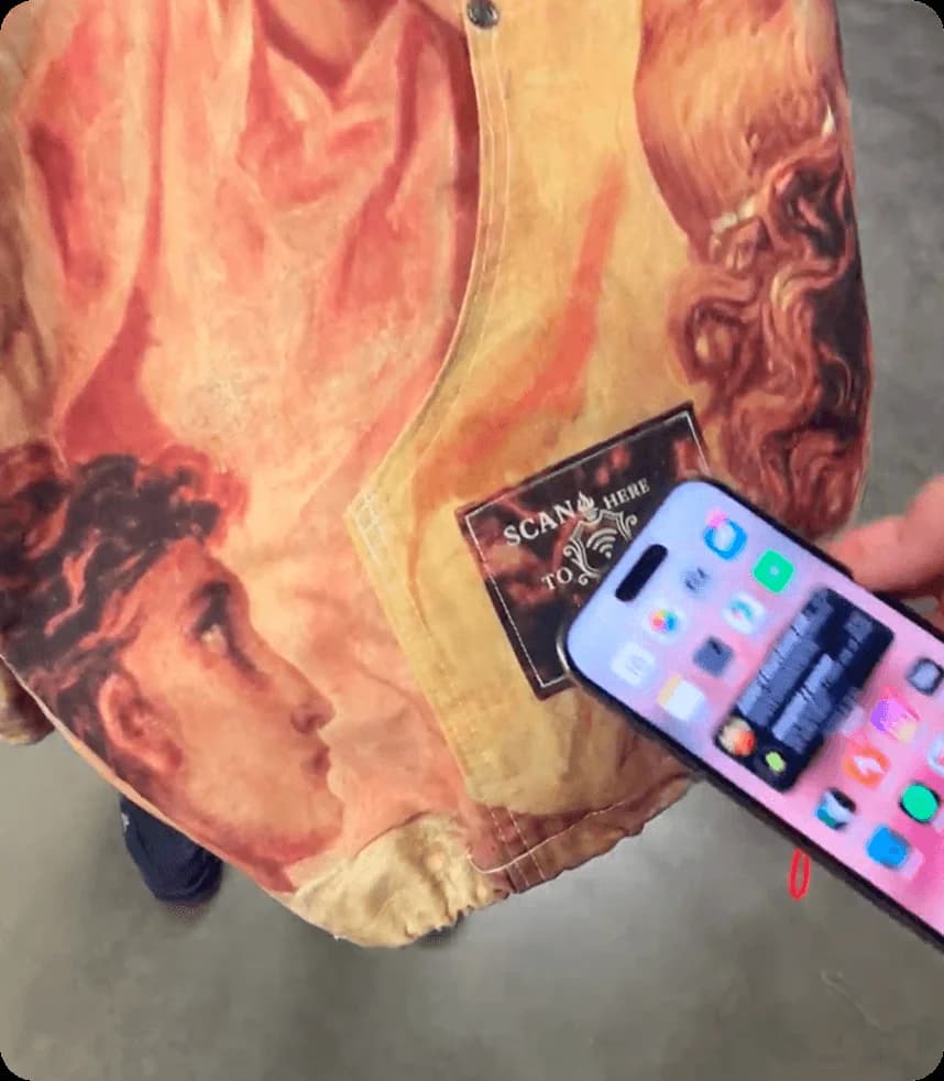 The Renaissance bomber, its patch tapped with a phone